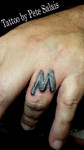 letter m on knuckle tattoo pistol petes tattoo saloon tattoo by pete salais best tattoo artist texas Tattoo shop tattoo studio 